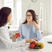 nutritionist and woman talking