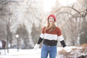 happy smiling woman in snow