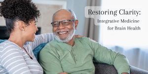 smiling elderly man sitting with younger woman