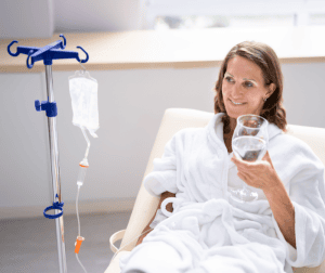 woman receiving IV therapy